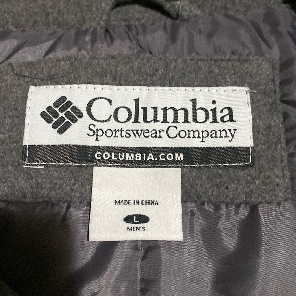 This is a gray coat. Very cozy and warm. Slightly worn